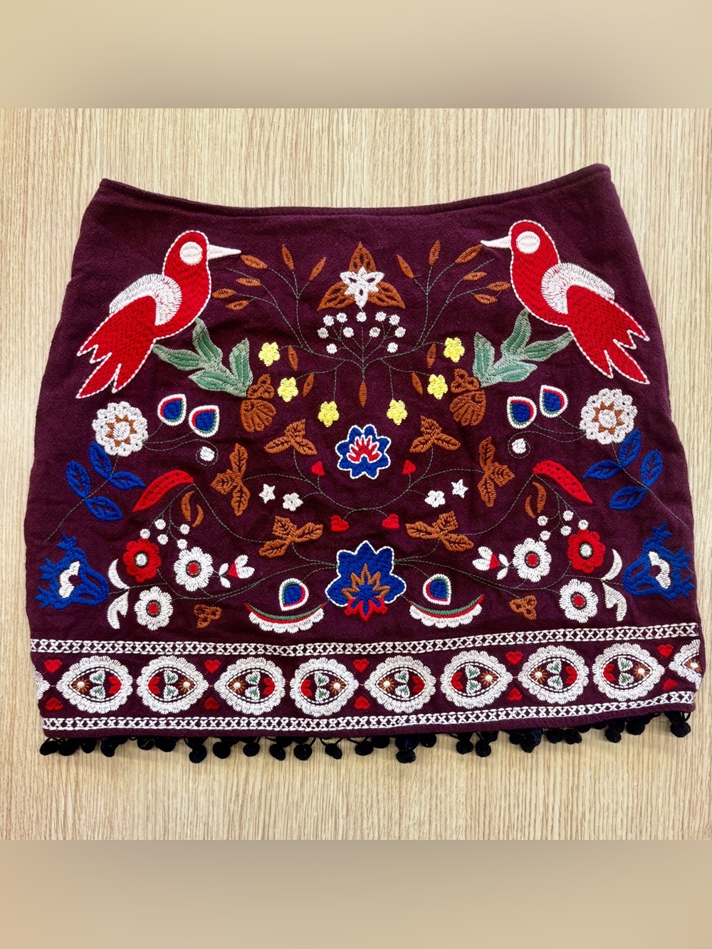 Altar’d State Embroidered Mini Skirt • Mirrored Bird & Floral • Pom Pom Trim • M